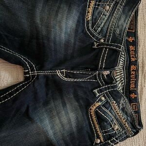 Rock Revival Blue Boot Cut Jeans with Distinctive Stitching